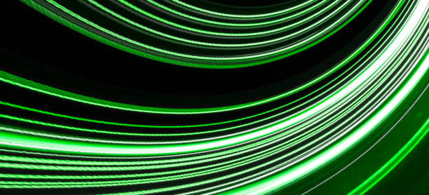 istock green car lights at night. long exposure 1328359181