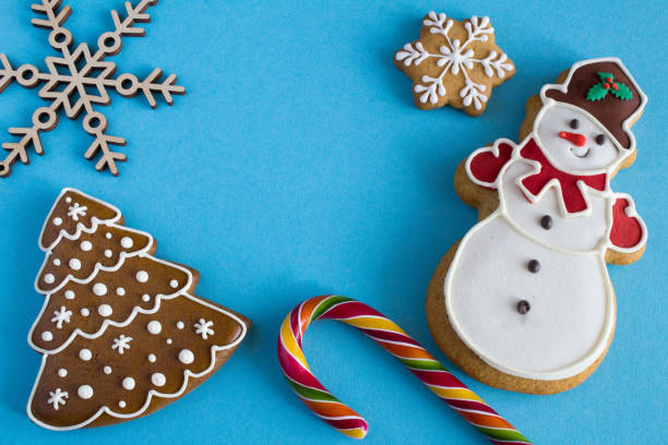 istock Christmas cookies on the blue  background. Top view. 1328359997