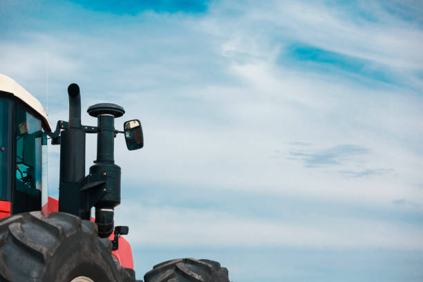 istock Exhaust pipe and sideview mirror of a tractor 1328361536