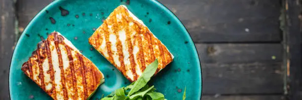 grilled cheese halloumi fried meal snack copy space food background rustic. top view