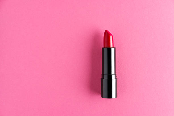 istock Red lipstick isolated on a pink background. 1328368686