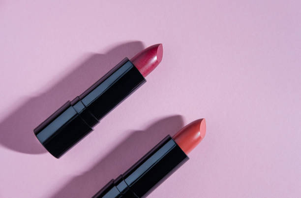 istock Set of lipsticks on light pink background. 1328368711