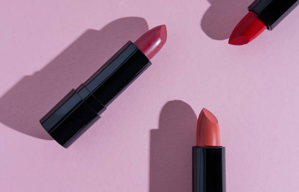 istock Set of lipsticks on light pink background. 1328368716