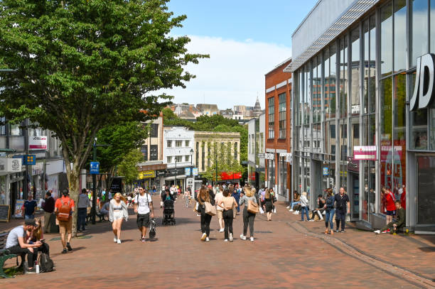 people in one of bournemouth's main shopping streets - bournemouth imagens e fotografias de stock