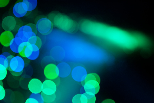 Blue and green bokeh lights texture background.
