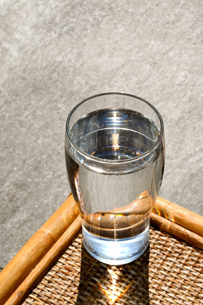 istock Pint glass of water outdoors in evening sunlight 1328376216