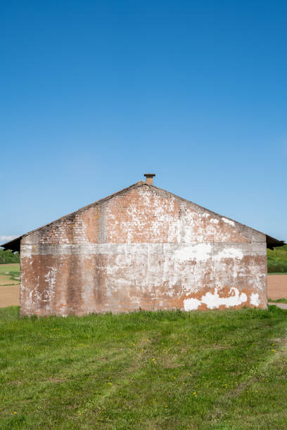 istock Old warehouse with red blocks in the countryside 1328379146