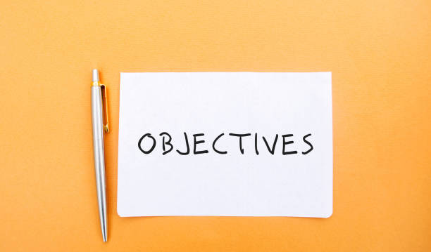 istock Note with the word Objectives. Planning, plans and tasks. New business ideas. Setting goals, target. Motivation, inspiration concept. Flat lay 1328380159