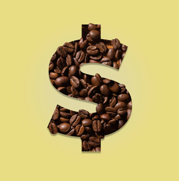 istock Dollar sign made from coffe beans 1328380375