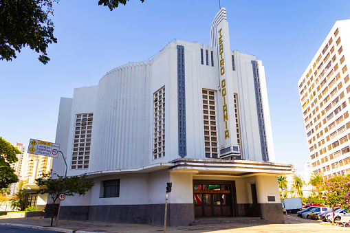 Goiânia, Goias, Brazil –  July 11, 2021: Detail of the facade of Goiania Theater with blue sky in the background. Building in Art Deco style.