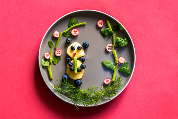 istock creative meal ideas for children on the plate, panda image, isolated 1328383319