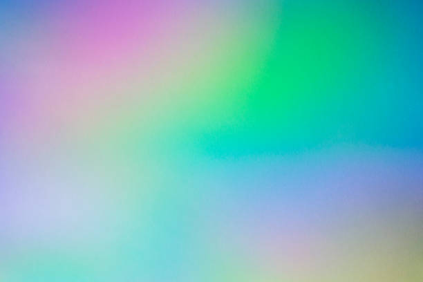 istock Blurred rainbow light refraction texture overlay effect for photo and mockups. Organic holographic flare on a white wall. Shadows for natural light effects 1328392691