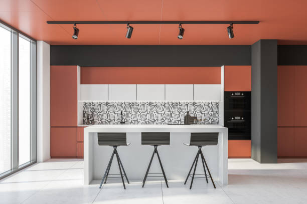 istock Orange and gray kitchen interior with bar 1328396202