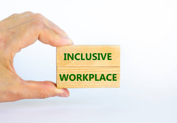 istock Inclusive workplace symbol. Wooden blocks with words Inclusive workplace on beautiful white background. Businessman hand. Business, inclusive workplace concept. Copy space. 1328399423
