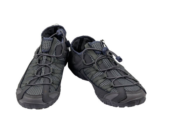 istock Gray male mesh sneakers isolated on white background 1328400314