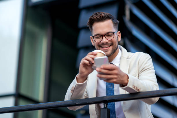 istock Smiling businessman on the way to office 1328403672