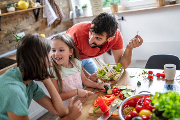 istock Family in kitchen, enjoying together 1328404725