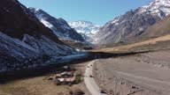 istock Road going through the mountains in Cajón del Maipo 1328405457