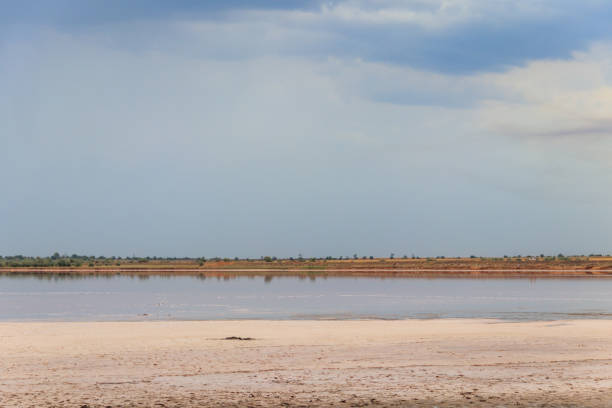 istock Dark storm clouds over a salt lake before a rain 1328406163