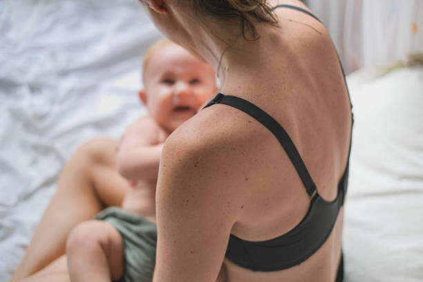 istock Mother Comforting Crying Baby 1328411016