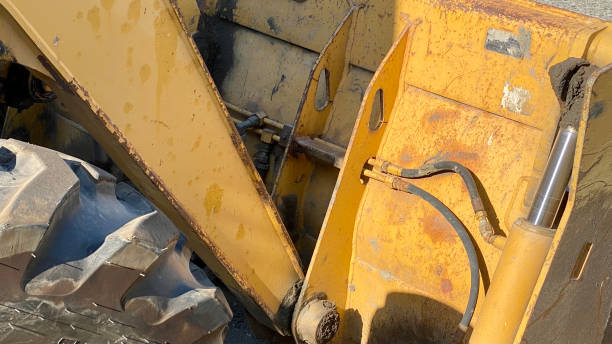 istock excavator teeth road repair water pipe cone 1328419585