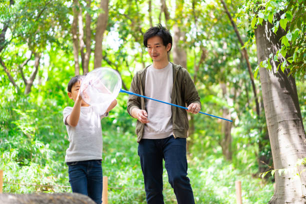 istock Little boy playing in the mountains 1328422513