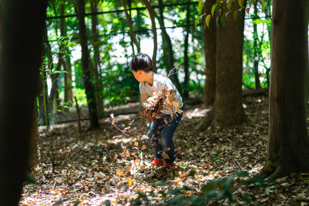istock Little boy playing in the mountains 1328423439