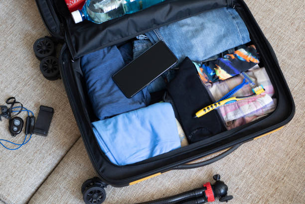 preparing for the trip, collecting things stock photo