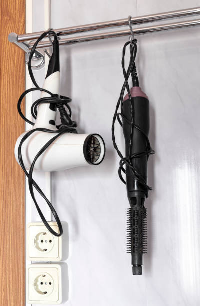 istock Hair dryers on a hanger 1328432811
