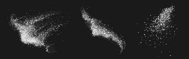 Scatters of sugar or salt crystals with white dust Scatters of sugar or salt crystals with white dust. Vector realistic set of stains of crushed pieces of chalk or sand, coarse culinary ground sea salt or sugar granules isolated on black background snow ground texture stock illustrations