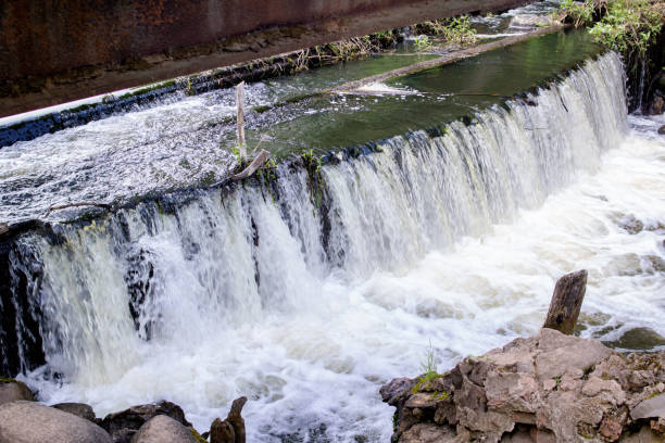 istock Water in a small waterfall in the forest 1328445560
