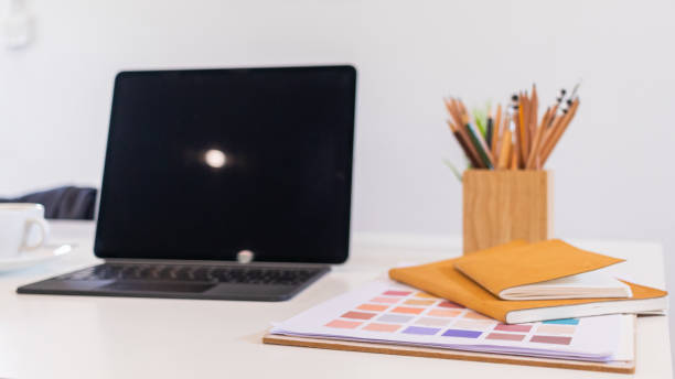 istock Designer computers and design equipment are placed on their desks to get them ready for work after a day's rest. concept for getting freelance jobs for designers in the online era 1328445984