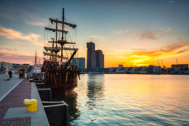 istock Harbor in Gdynia with modern architecture at sunset. 1328447753