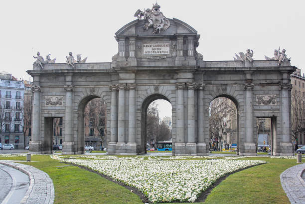 Picture of Puerta de Alcalá in Madrid, Spain Picture of Puerta de Alcalá in Madrid, Spain. No people and traffic cars alcala de henares stock pictures, royalty-free photos & images