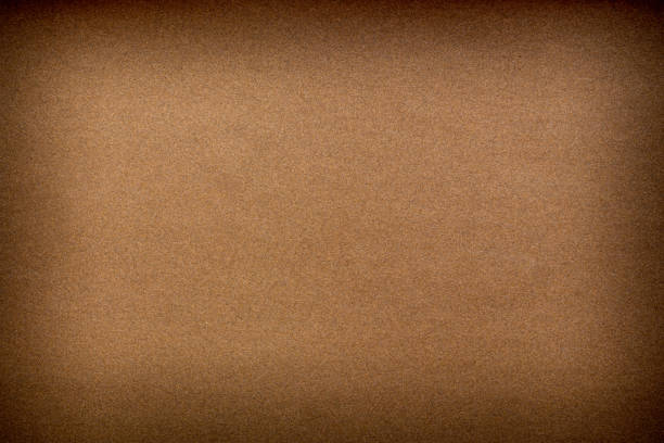 istock Sandpaper texture background where you can see the red-brown sand grain pattern on the sandpaper, suitable as a background for inserting text. Copy Space for designers to use on sandpaper. 1328454589