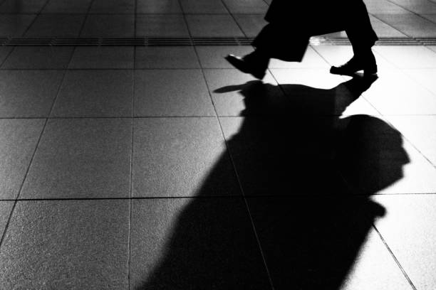 istock Silhouette of a walking person's foot 1328458324