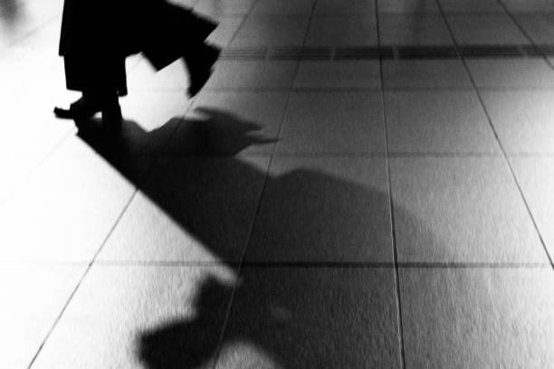 istock Silhouette of a walking person's foot 1328458341