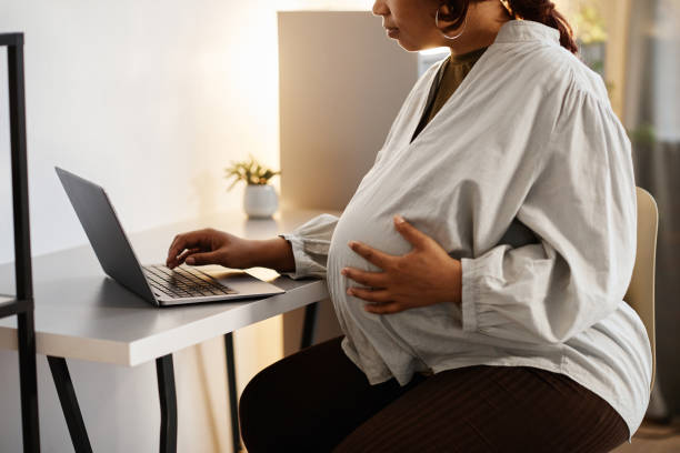 istock Pregnant Woman Working from Home 1328458812