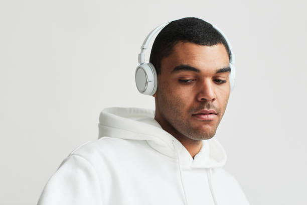 istock Handsome Man Wearing Headphones 1328462345