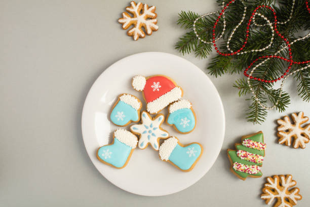 istock Christmas gingerbread on the plate on the gray background. Top view. Copy space. 1328462422