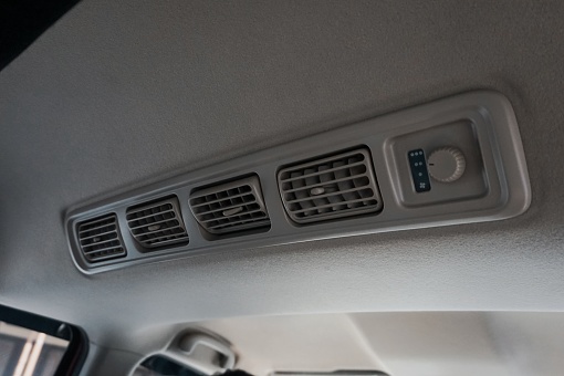 Hole for air exit from Air conditioner on car with gray walls