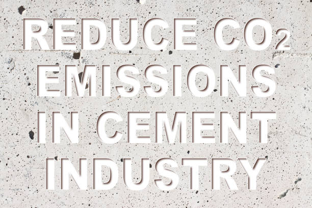 istock Reduce CO2 production in cement Industry and emissions in atmosphere - low-carbon cement production concept with a portland concrete wall and cement background 1328466909