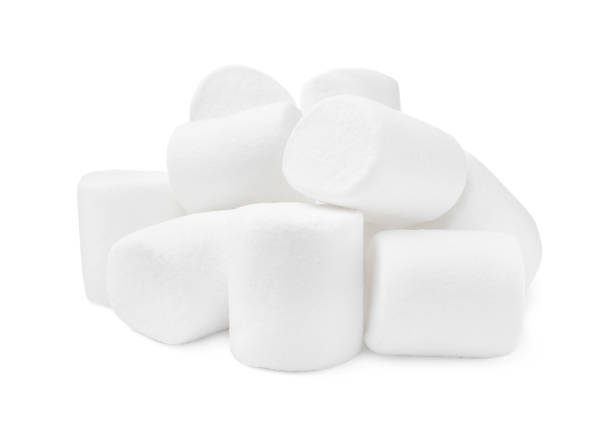 istock Pile of delicious puffy marshmallows on white background 1328469457
