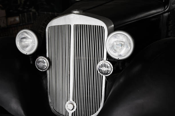 istock Close up of black retro car 1328470383