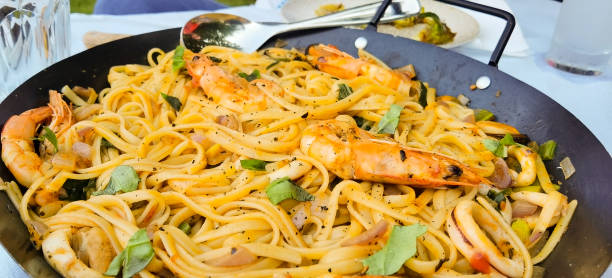 shrimps spaghetti  just cookes and served greece