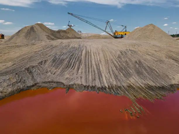 Walking excavator on the titanium mine. Industrial landscape