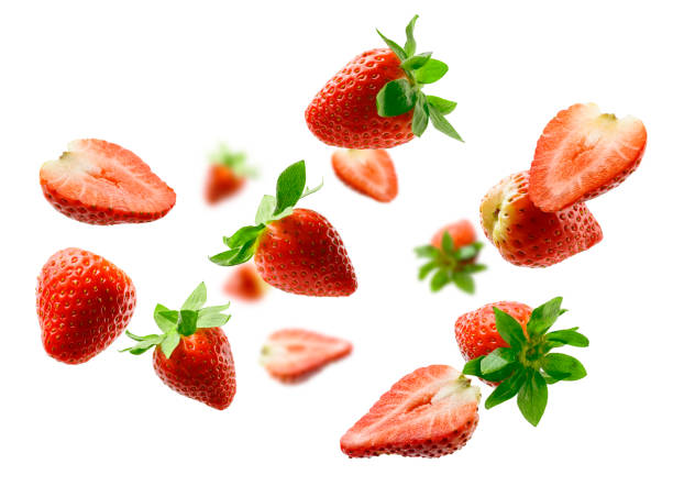 Strawberry berry levitating on a white background stock photo