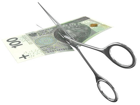 Polish zloty falling money finance crisis scissors