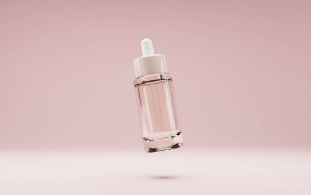 Glass dropper bottle cosmetic oil or serum mock up banner. Realistic vial with pipette for medical drops, clear container collagen essence on isolated beige background, product ad 3d illustration Glass dropper bottle cosmetic oil or serum mock up banner. Vial with pipette for medical drops, clear container collagen essence on isolated beige background, product ad. Realistic 3d illustration serum sample stock pictures, royalty-free photos & images