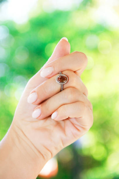 istock women's jewelry gold ring on the hand 1328483879